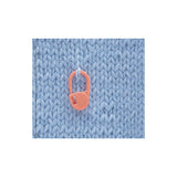 353 locking stitch marker hanging from a knit stitch