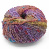 214 fluffy yarn in purples and rusts with pops of color in red and wine