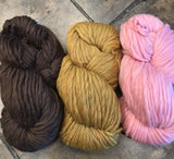 Cascade Magnum Yarn three colors: mocha heather, birch heather, strawberries and cream