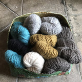 A selection of Baby Alpaca Chunky yarns in a basket